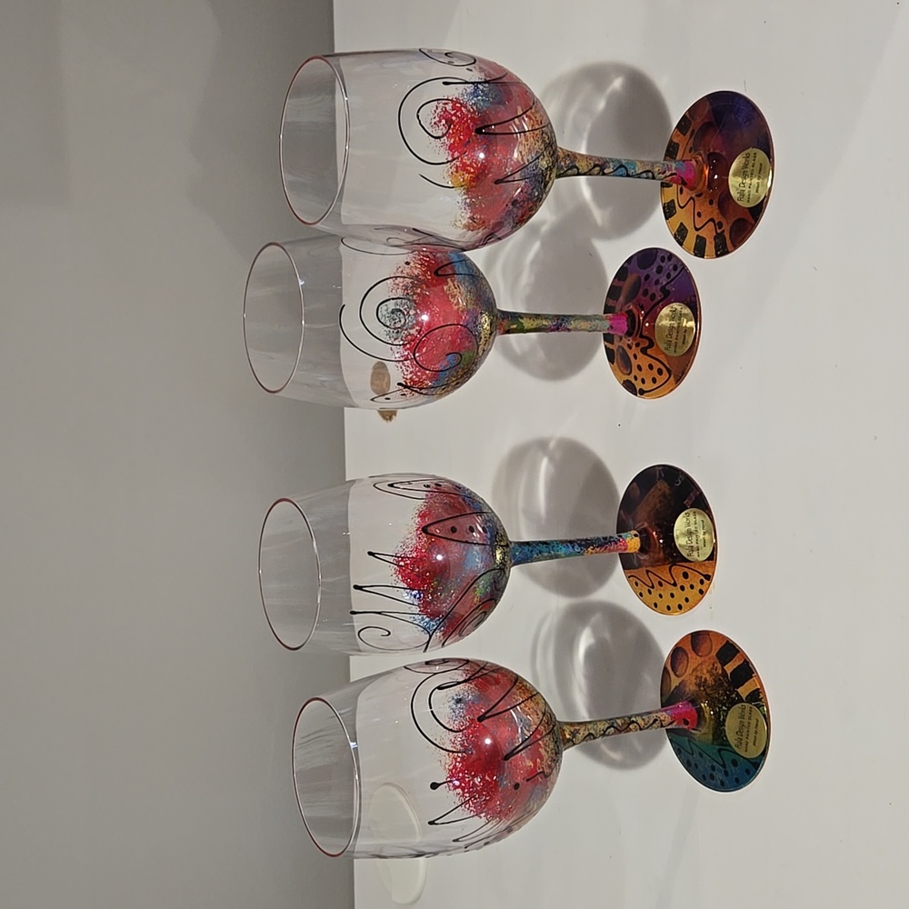 4 Multi colored, hand painted wine glasses from Artist Nancy Fiala
